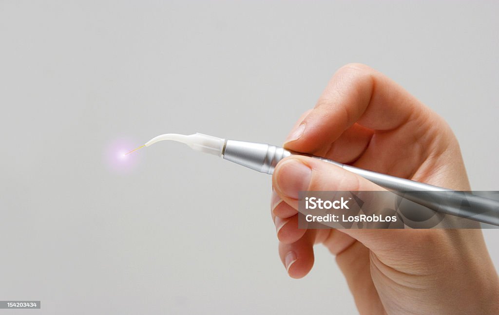 hand mit dental laser system - Lizenzfrei Laserskalpell Stock-Foto