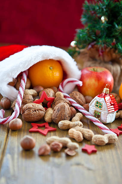 Christmas stocking filled with fruit and nuts