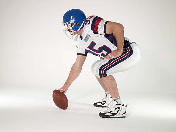 istock American Football Player Center Snap 154205090