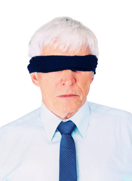 Black blindfold business man isolated on white stock photo