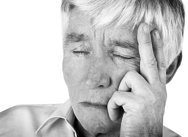 istock Closeup black and white image of a worried retired man 154208302