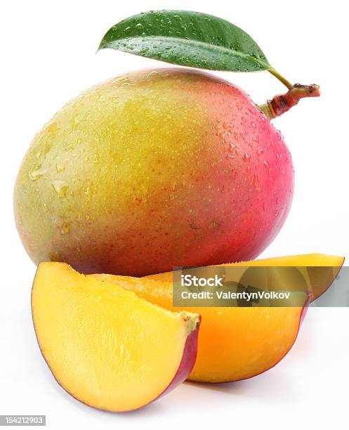 Mango Con Rebanadas Foto de stock y más banco de imágenes de Mango - Fruta tropical - Mango - Fruta tropical, Frescura, Gota - Líquido