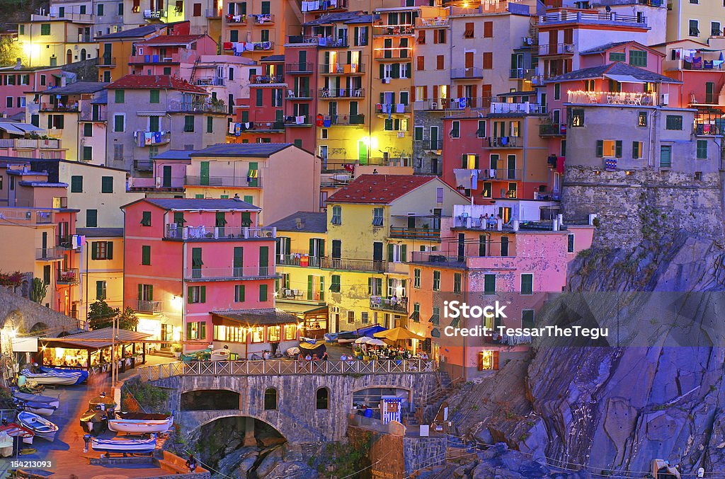 Blue hour at Manarola, Cinque Terre, Italy View of Manarola just after sunset Ancient Stock Photo