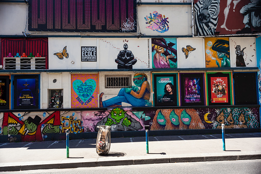 Closeup of a wall with colorful graffiti artwork