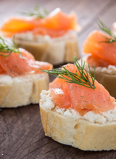 istock Baguette with Salmon on wood 154214628