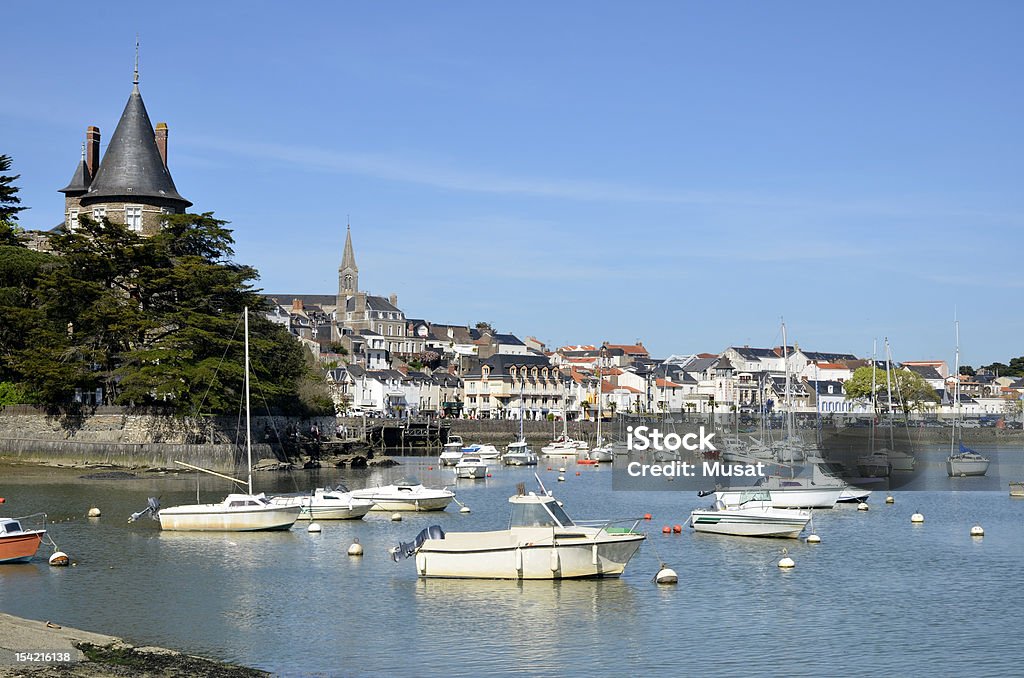 Picture of the Port of Pornic in France with clear blue sky Port of Pornic at high tide in Pays de la Loire region in western France Harbor Stock Photo