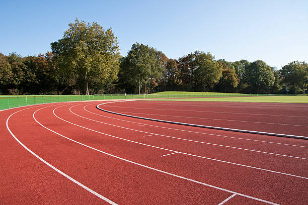 Running track Running track lines on a sunny day athleticism photos stock pictures, royalty-free photos & images