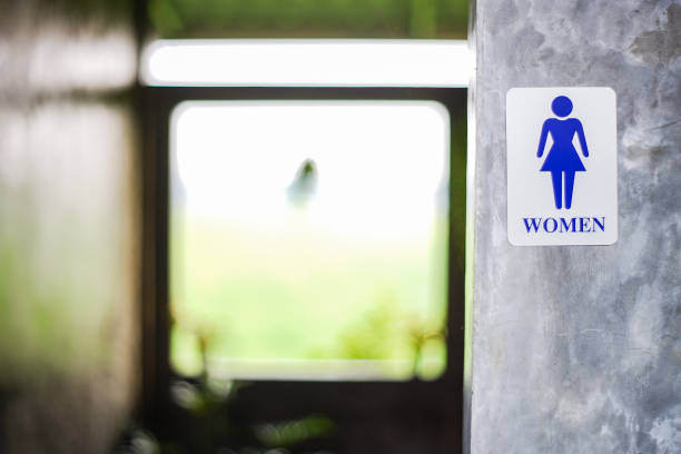 The entrance to the bathroom with the ladies symbol