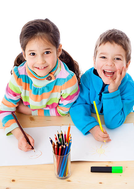 istock Two little kids draw with crayons 154221510