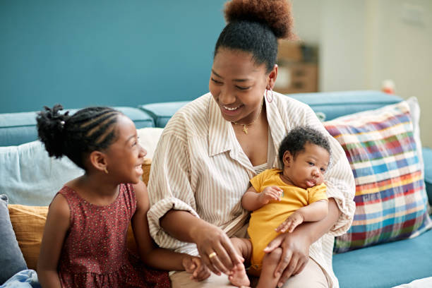 istock Lighthearted Black mother and young children 1542229217