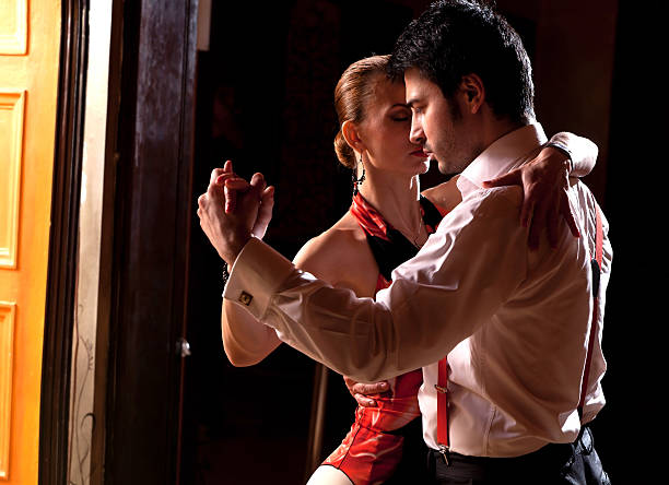 Dancer Portrait A man and a woman dancing argentinian tango. Please see more images from the same shoot. tango dance stock pictures, royalty-free photos & images