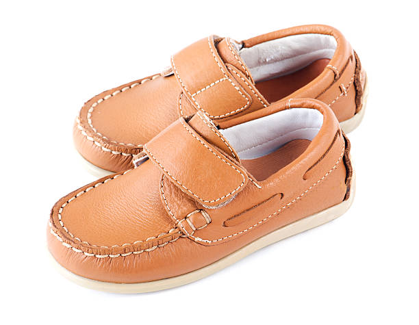 istock Baby brown shoes 154224852