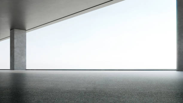 istock 3d rendering of empty concrete room with sunlight through the large window. Abstract architecture with cement floor. 1542252143