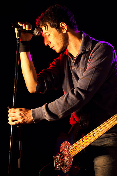 istock Sad Singer with Electric Bass 154228410