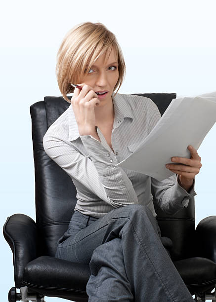 istock Pensive  businesswoman with documents 154229549