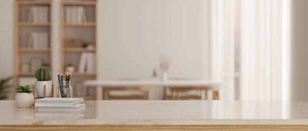istock An empty space on a white marble tabletop in a beautiful minimalist living room. 1542312179