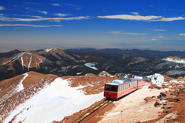 Pikes Peak Train View of Pikes Peak and Manitou Springs Train on the top of Pikes Peak Mountain, Colorado, USA colorado springs photos stock pictures, royalty-free photos & images