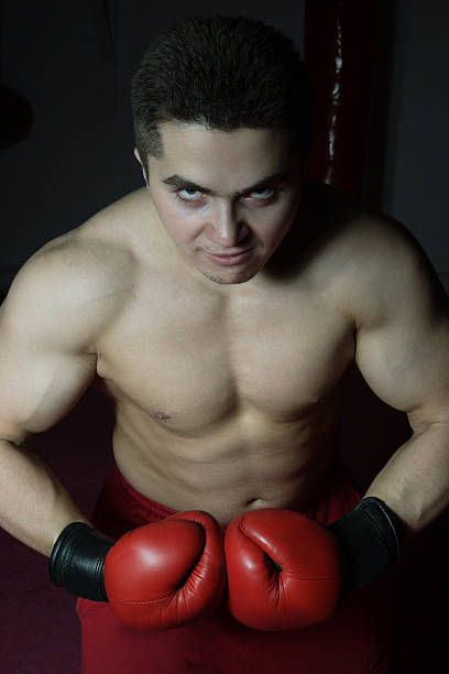 istock The young boxer in boxing gloves 154234450