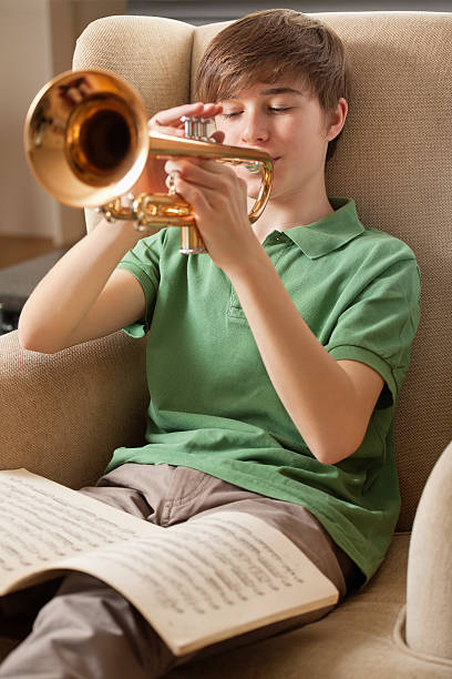 istock Playing the trumpet at home 154234721