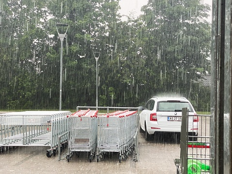 Extreme weather in Scandinavia. The photo was taken guring cloud burst outside a store during cloud burst on July 10th, 2023 in Farum, Denmark.