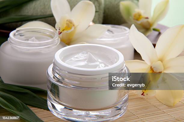 Orchid And Face Cream Stock Photo - Download Image Now - Beauty Product, Beauty Spa, Beauty Treatment