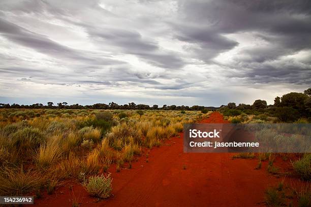 Entroterra Australiano Road - Fotografie stock e altre immagini di Australia - Australia, Deserto, Nube temporalesca