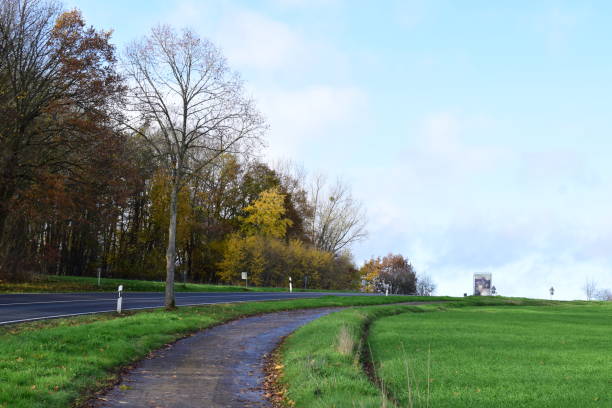 istock country road curve in autumn 1542400043