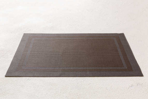 istock Perspective view of brown tablecloth for food on cement background. Empty space for your design 1542401098