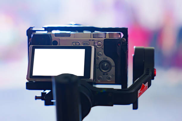 istock white screen video camera. shooting a video at a celebration or concert. 1542417469
