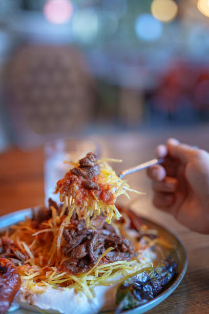 istock Crispy potato fries with grilled chicken slices 1542446758