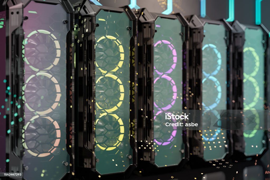 Computer Cases In A Row With Multicolor Neon Lights Stock Photo ...