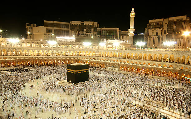 Pilgrims circumambulate the Kaabah Pilgrims circumambulate the Kaaba at Masjidil Haram in Makkah, Saudi Arabia. Muslims all around the world face the Kaaba during prayer time. kaabah stock pictures, royalty-free photos & images