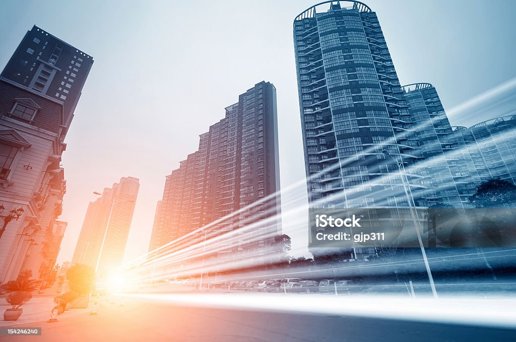 the light trails the light trails on the modern building background in shanghai china Abstract Stock Photo