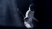 First person POV two professional fencers foil swords facing each other in combat