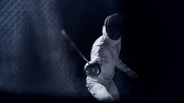 first person pov two professional fencers foil swords facing each other in combat - fencing sport rivalry sword imagens e fotografias de stock
