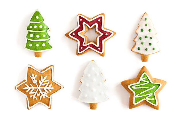 Christmas Ginger cookies on isolated white background Christmas Ginger and Honey cookies on isolated white background. Star, fir tree, snowflake shape. Christmas Tree Cookie stock pictures, royalty-free photos & images
