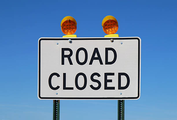 istock Road closed sign against a bright blue sky 154248549
