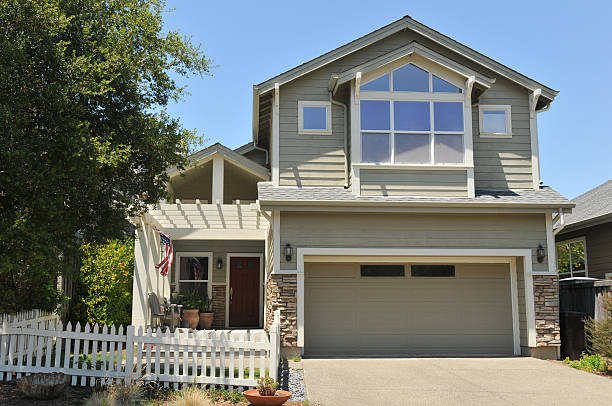 istock Two story single family house with driveway 154248657