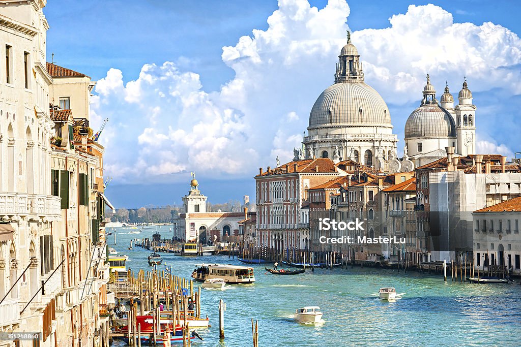 Venice during Carnival holiday, Italy. View of basilica off Santa Maria della Salute from Accademia bridge, venice, Italy. Venice - Italy Stock Photo