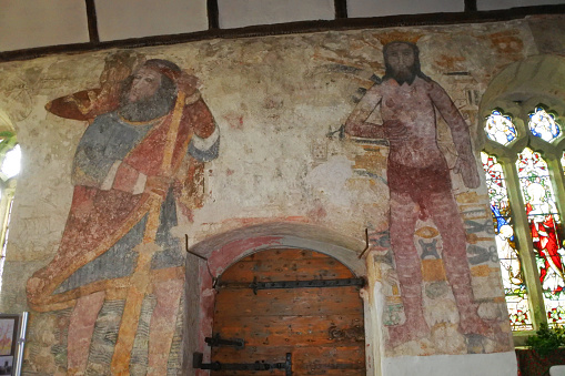 The very rare pre-reformation wall paintings at Breage Church, Cornwall.