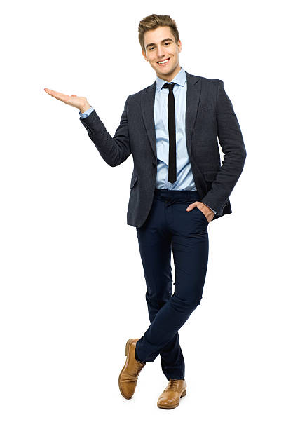 istock Young businessman showing something 154250541
