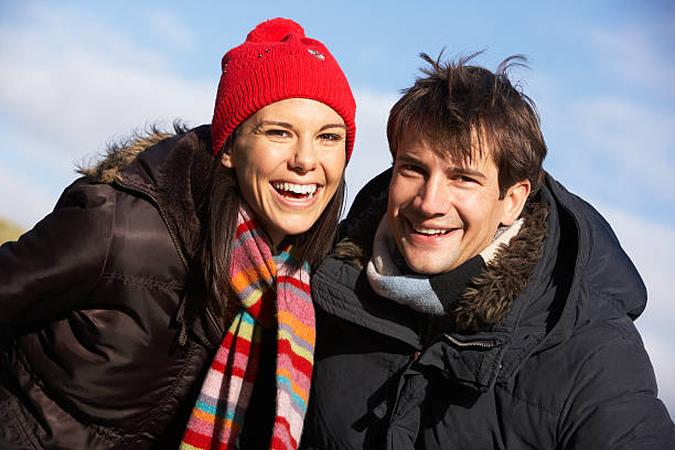 istock Couple Laughing In The Park Together 154250591
