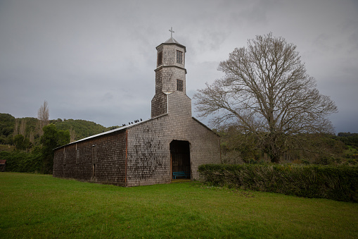 Traditional antique wood church in the archipelago of Chiloe at the Chilean Lake District, Chile