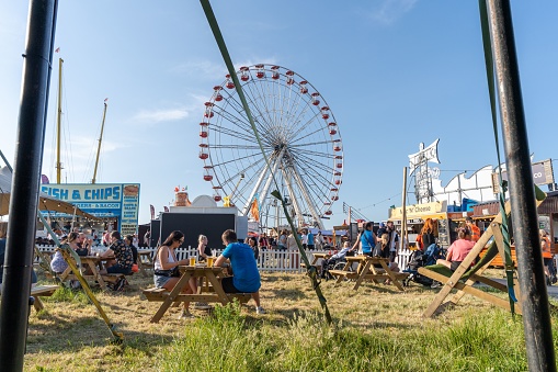 Newcastle upon Tyne, United Kingdom – June 16, 2023: A view of the Big Wheel at The Hoppings funfair, fairground or showground in Newcastle upon Tyne, UK.
