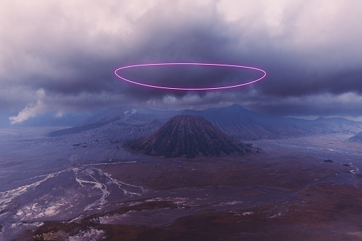 Bright neon ellipse at dramatic volcanic landscape with mountains at Bromo  Tengger Seamer National Park on Java island - Metaverse, Web3 inspiration