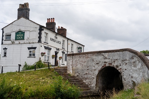 Middlewich, United Kingdom – July 01, 2023: The Kings Lock pub at Middlewich, Cheshire, UK, on the Trent and Mersey Canal.