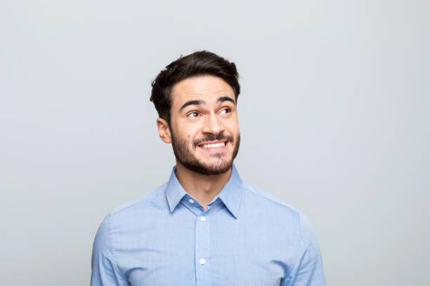 istock Headshot of surprised young businessman 1542565744