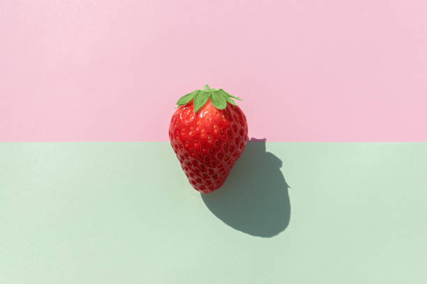 istock Strawberry, minimalist photography. 1542568011