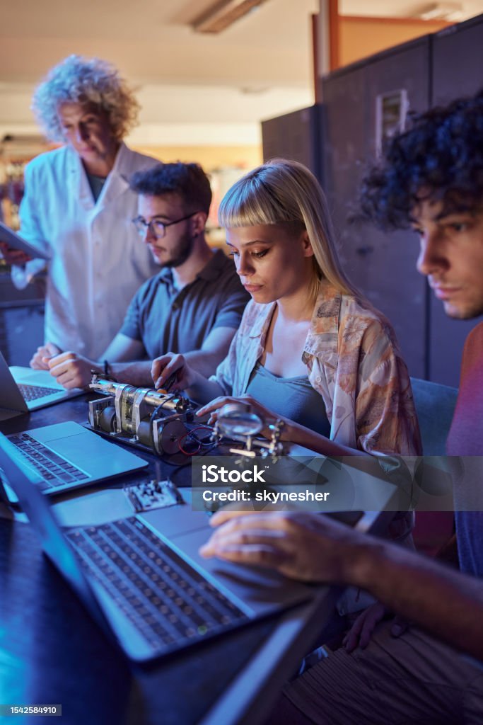 Young Programmers Using Computers During Robotics Class In Laboratory ...