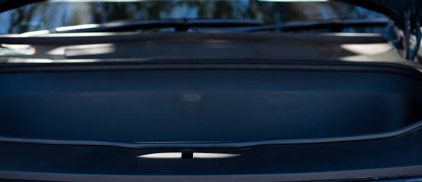 istock Panorama view frunk underneath the hood lockable waterproof storage compartment of modern electric truck trunk parked outdoor in Dallas, Texas, USA 1542645759